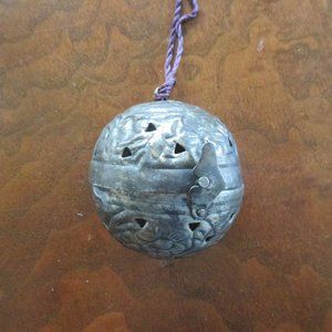 Unusual hinged metal ball w clasp holds incense or pot pourri on purple cord